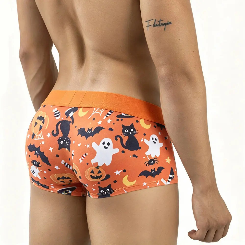 Men's Halloween-themed short boxers in orange with ghost cat and bat prints shown from the back by MetroMaleWear M2W
