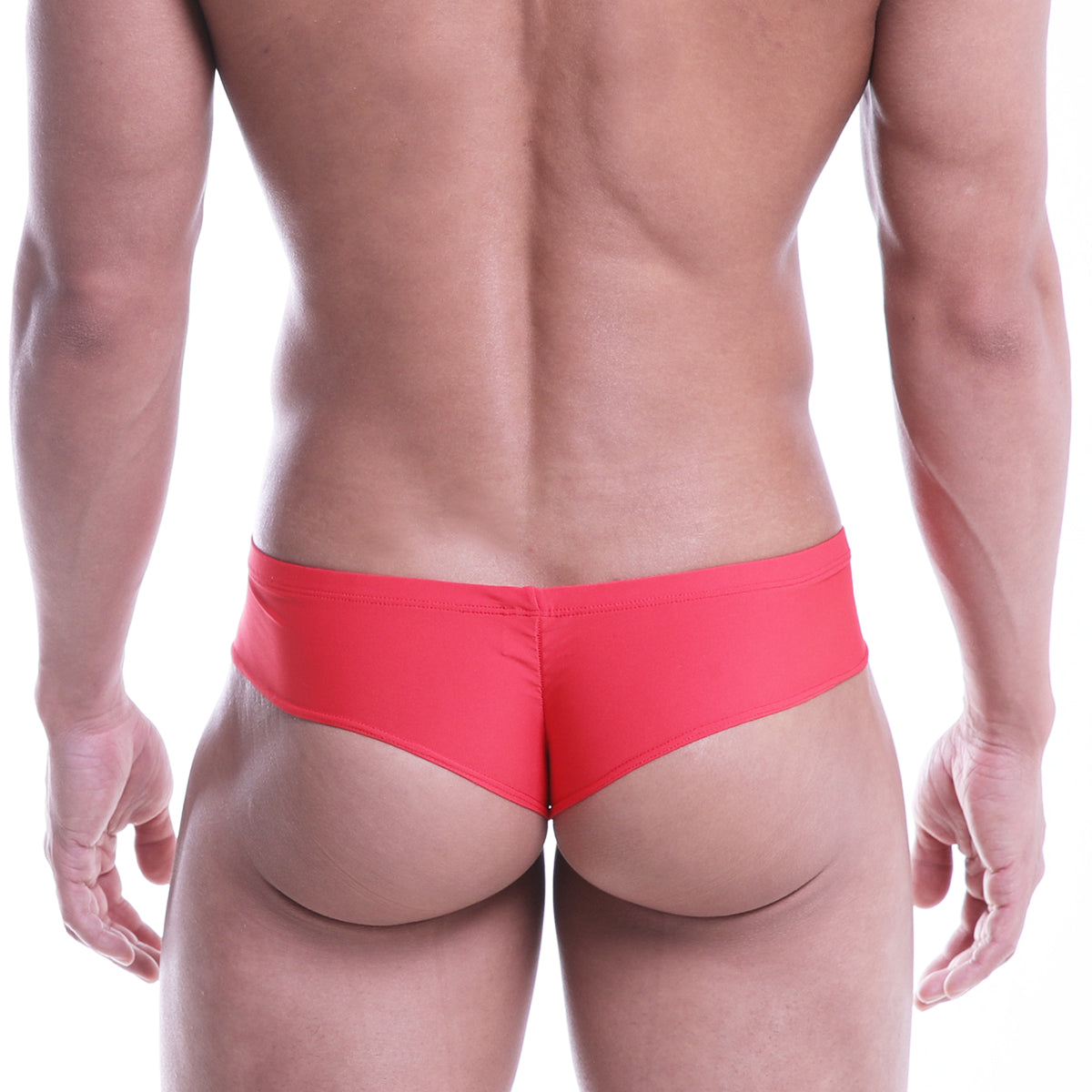Bright red sleek form-fitting swim trunks MetroMaleWear Micro Cheek designed for swimming and sunbathing
