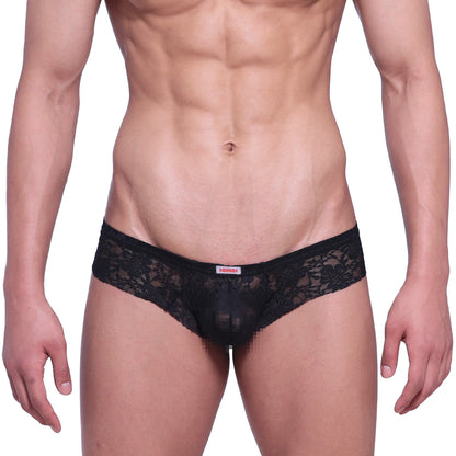Black lace thong with delicate floral pattern and small red brand tag on waistband from metromalewear micro cheek lace line