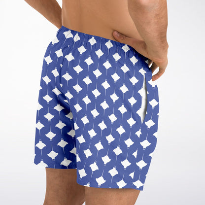 Men's swim shorts in blue with white manta ray pattern featuring an elastic waistband and side pockets by Maris Equi.