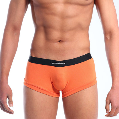 Orange MetroMaleWear waist boxer briefs with a black waistband featuring the mettamewear brand name in white letters