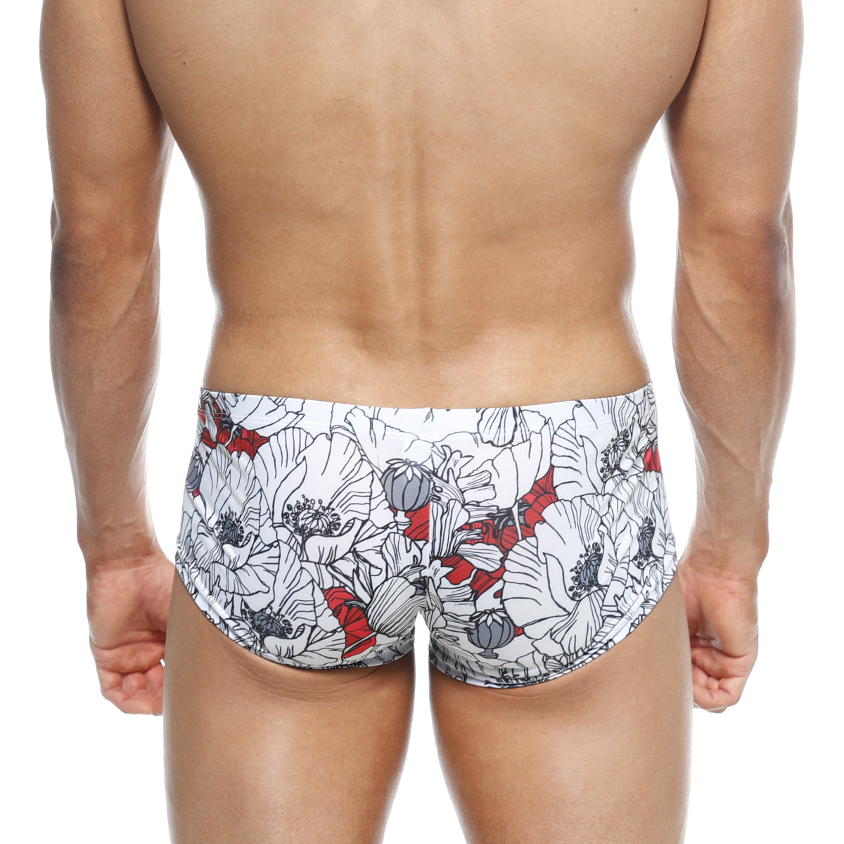 White swim trunks metro male wear oscar boxer escobar 2125-09 with bold floral pattern black outlines and red accents