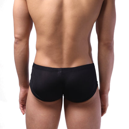 MetroMaleWear Oscar Boxer black form-fitting swim trunks with smooth stretchy fabric and snug waistband front view
