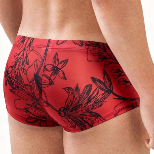 Red floral print men's trunk by MetroMaleWear featuring a fitted design and soft stretch material shown from the back.