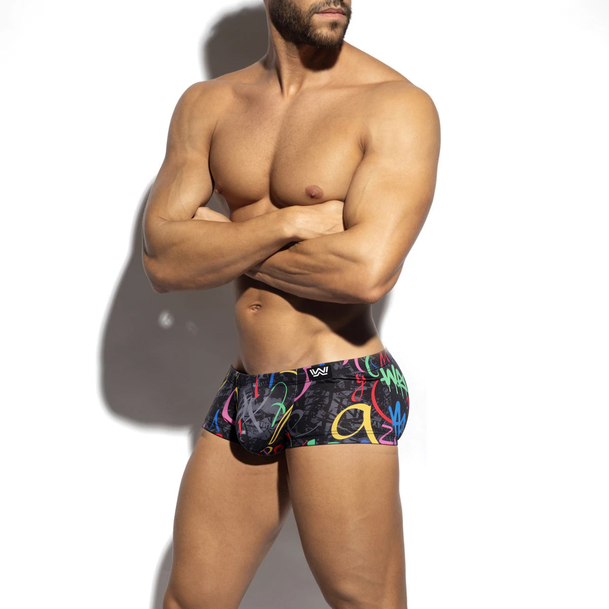 Black briefs metroMalewear pinaculo trunk 2125-85 with vibrant rainbow graffiti pattern and small white waistband logo
