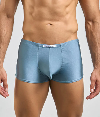 Justin plus simon classic boxer light blue shiny satin briefs with white brand tag at the waistband front view