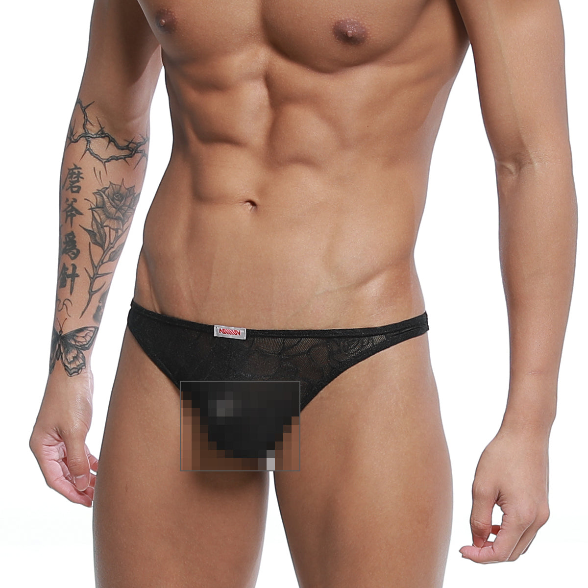 Black lace-trimmed metro male wear pouch thong rose 2302-31 with subtle pattern and waistband brand tag