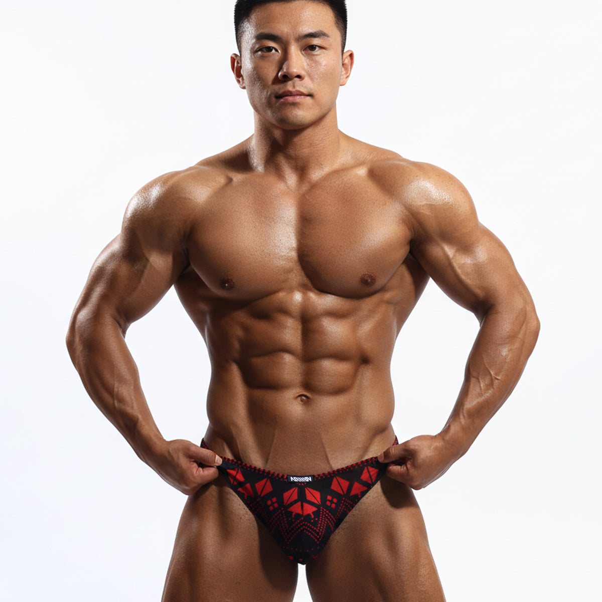 Black and red patterned athletic briefs with geometric design from metro male wear spade thong 2302-74