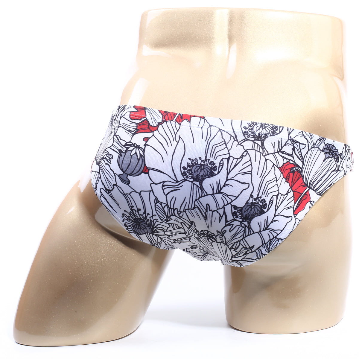 White swim trunks with bold floral pattern black outlines and red accents from metromalewear vendeta bikini blossom 2614-09