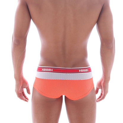 Orange mesh briefs with neon orange triple boxer design and red white amiri waistband in black lettering