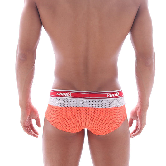 Orange mesh briefs with neon orange triple boxer design and red white amiri waistband in black lettering