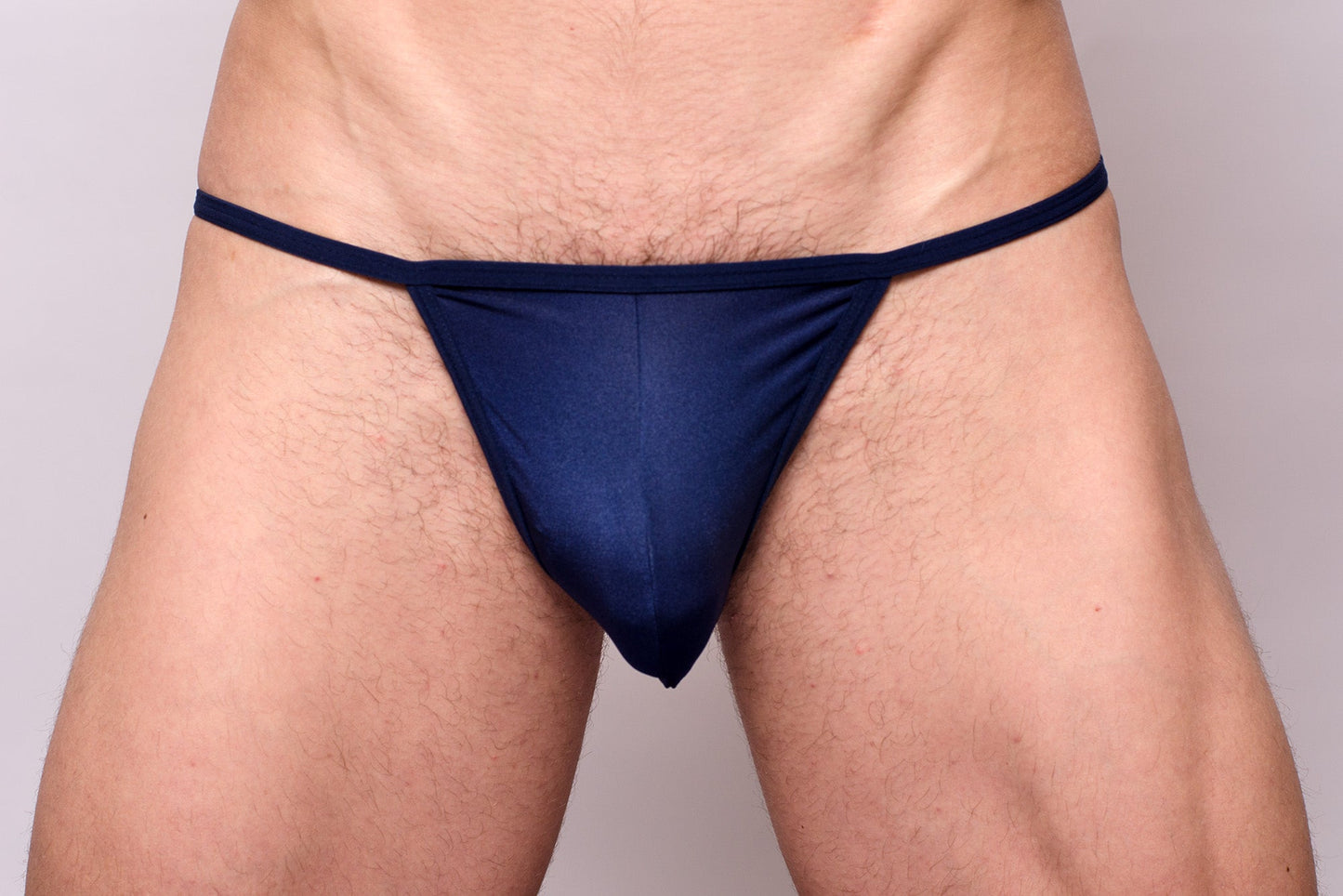 Navy blue thong from 3-pack pride metro string bikini made of smooth stretchable fabric with narrow waistband and minimal coverage