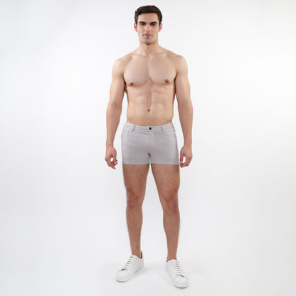 Light gray 3 inch stretch knit tailored shorts with single button closure and modern clean design
