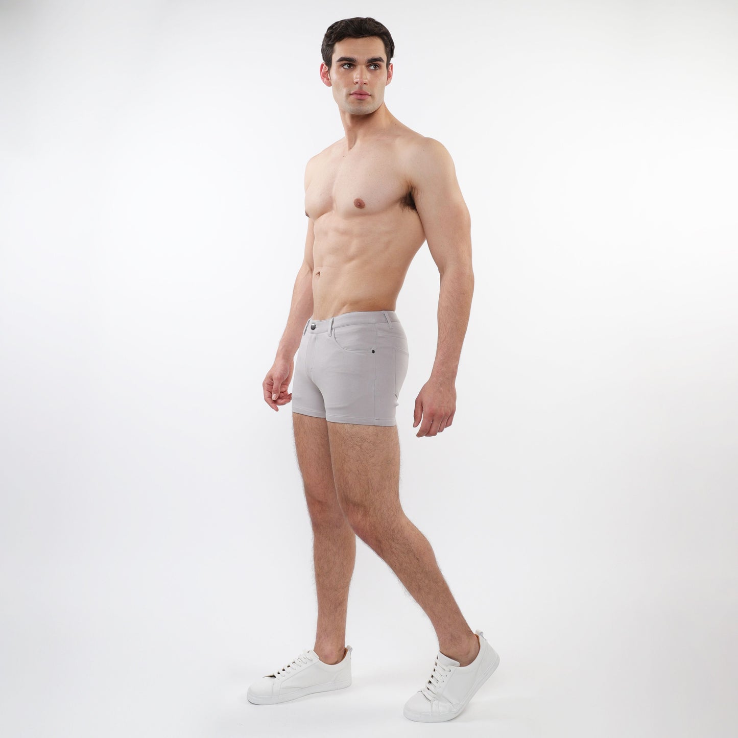 Light gray 3 inch stretch knit slim fit men’s shorts with classic five pocket design and subtle stitching details
