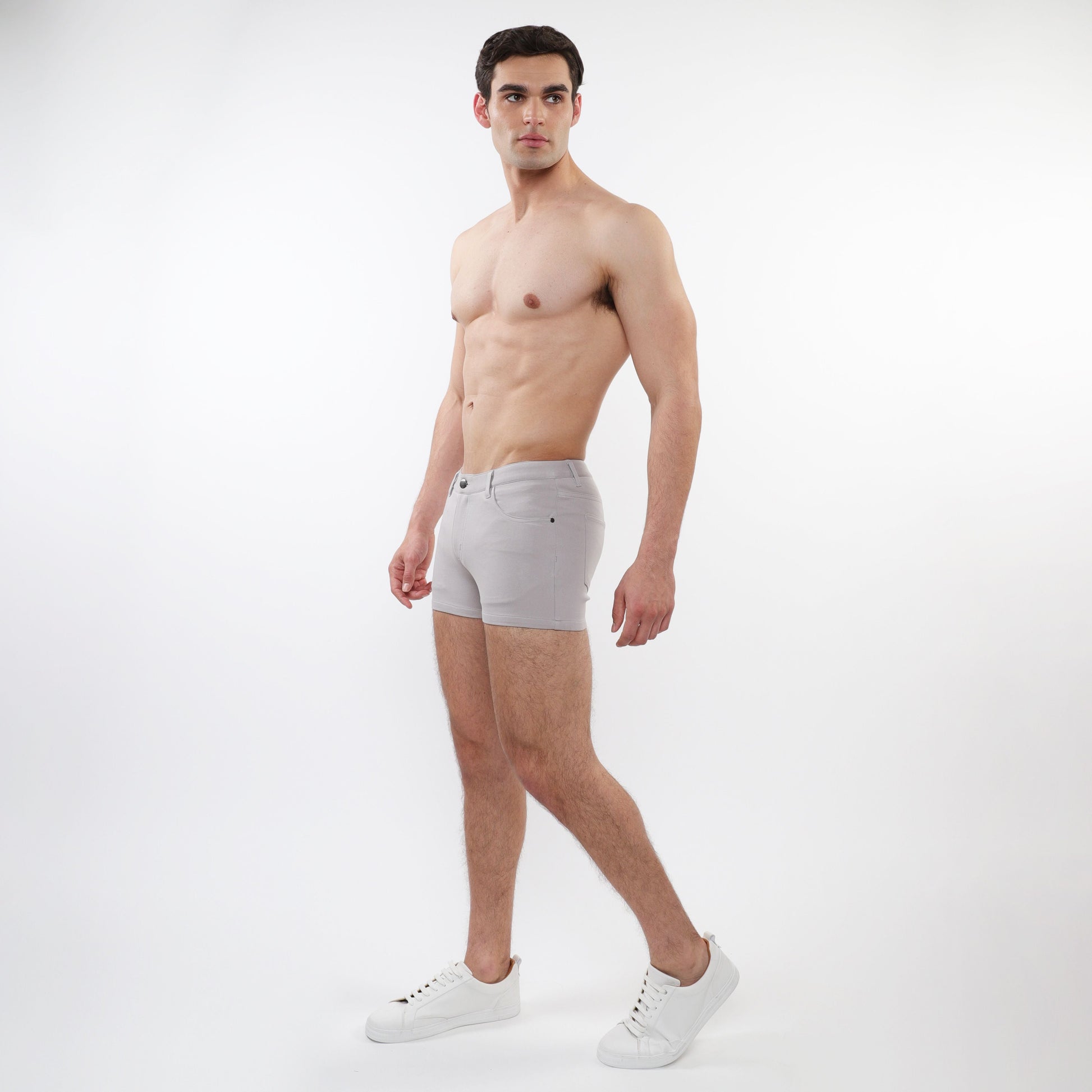 Light gray 3 inch stretch knit slim fit men’s shorts with classic five pocket design and subtle stitching details