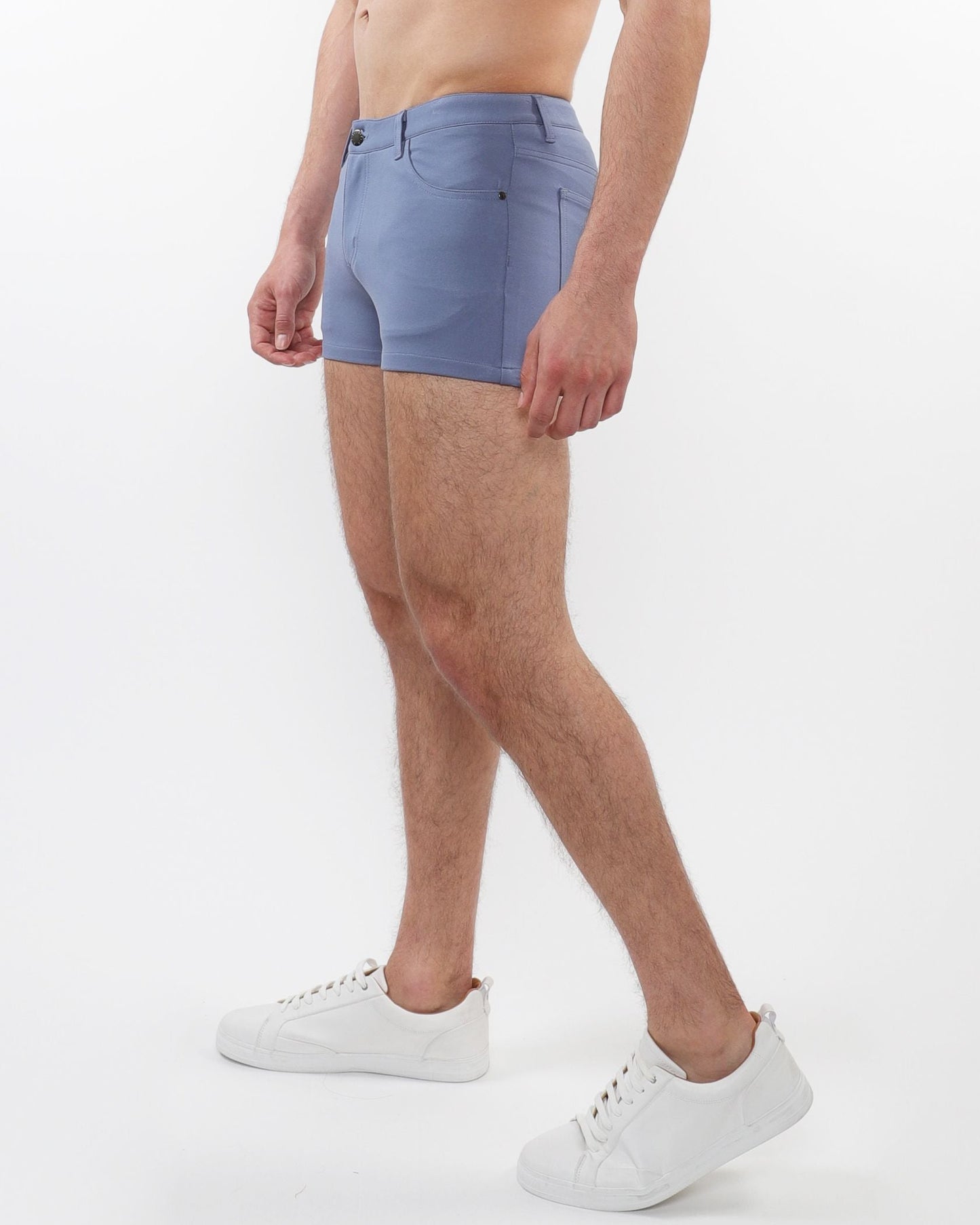 Blue denim 3 inch stretch knit shorts with classic five pocket design and button closure