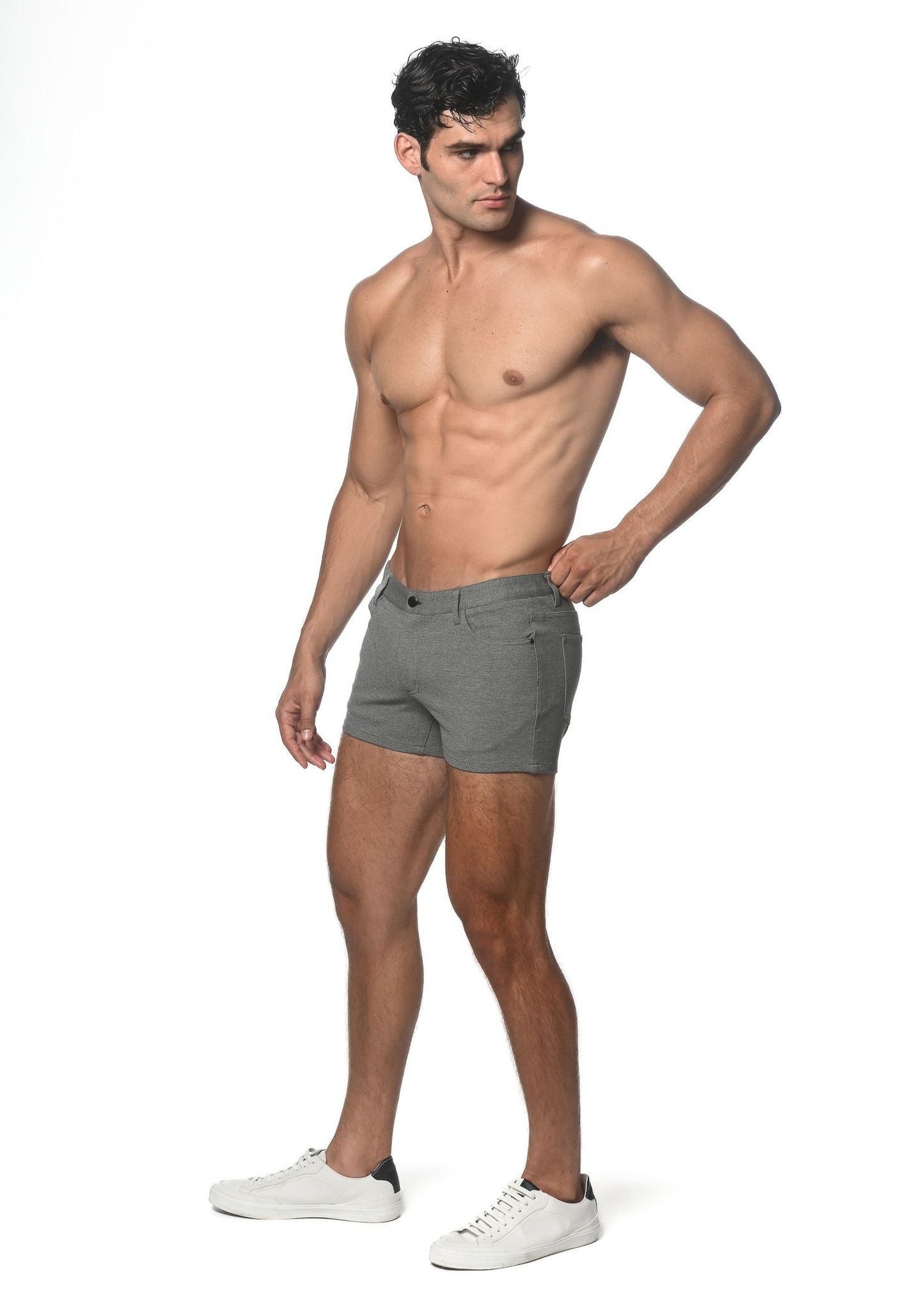 Gray men’s 3 inch stretch knit shorts with classic five-pocket design and subtle stitching details