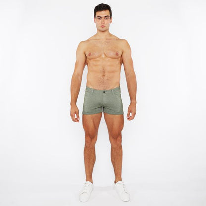 A pair of olive green 3 inch stretch knit two tone briefs with textured fabric pattern and button closure