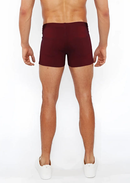 Maroon 3 inch stretch knit duo tone short athletic briefs with smooth form fitting fabric and subtle side seam detailing