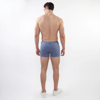 Blue denim 3 inch stretch knit shorts with classic fit and rear pockets shown from the back side