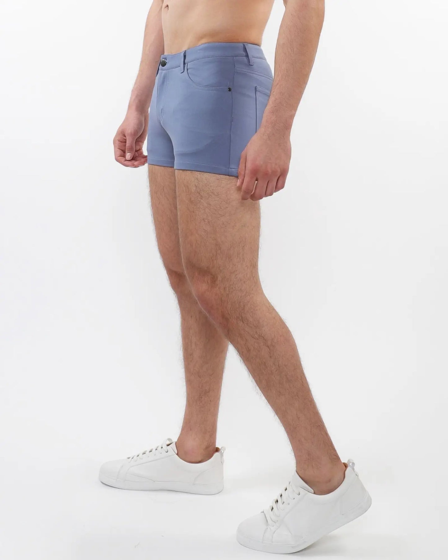 Blue denim 3 inch stretch knit shorts with classic five pocket design and button closure