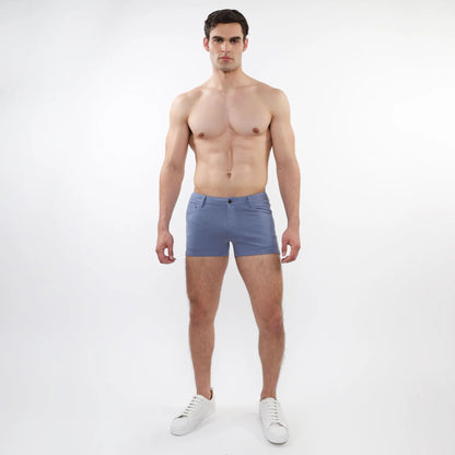 A pair of men’s light blue slim-fit 3 inch stretch knit shorts with five-pocket design and button closure