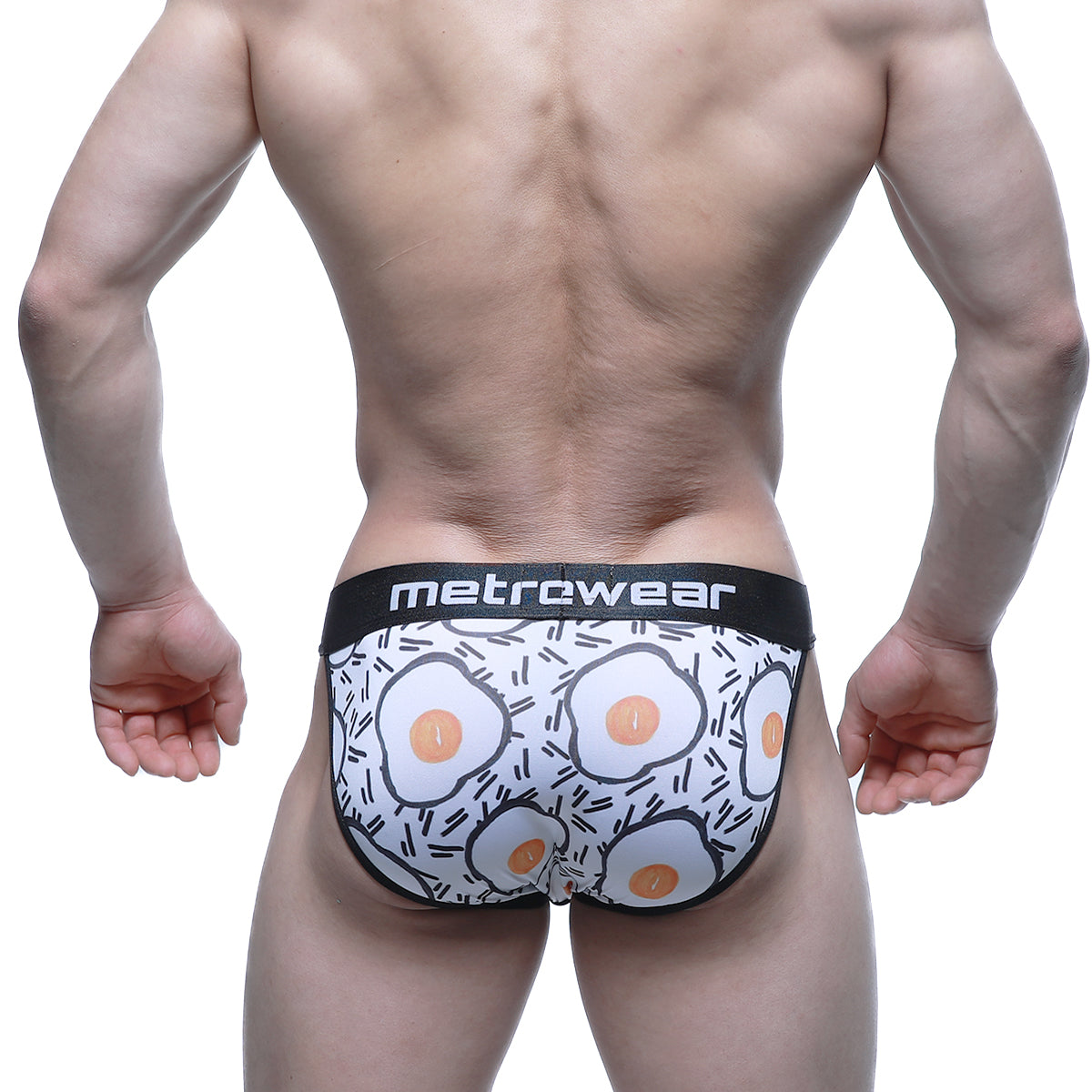 White men’s briefs with fried egg pattern and black trim featuring metrcwear brand on waistband metroMaleWear Sunny Side Bikini 3004-55
