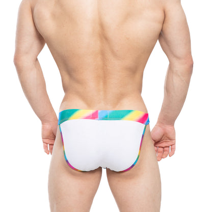 White swim trunks with vibrant rainbow-striped waistband and trim by metromalewear new pride bikini 3004-57