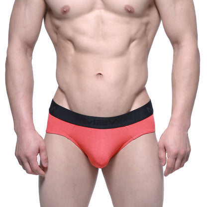 Coral cotton metro malewear hip briefs with black elastic waistband featuring the mev logo for comfortable daily wear