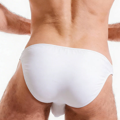 White smooth-textured cotton swim trunks with a sleek minimalist design from MetroMaleWear Perfect Scene collection