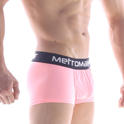 Pink metromale boxer briefs with black waistband featuring white metro male wear lettering for comfortable fit