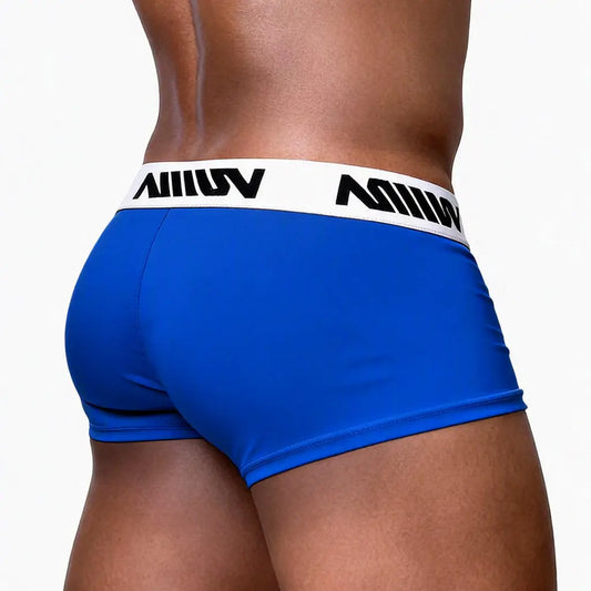 Royal blue men's trunk with a white branded waistband shown from the back by MetroMaleWear M2W
