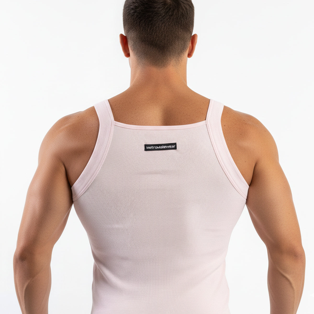 Back view of a metro malewear primo pink white ribbed tank top with thin straps and a small black label