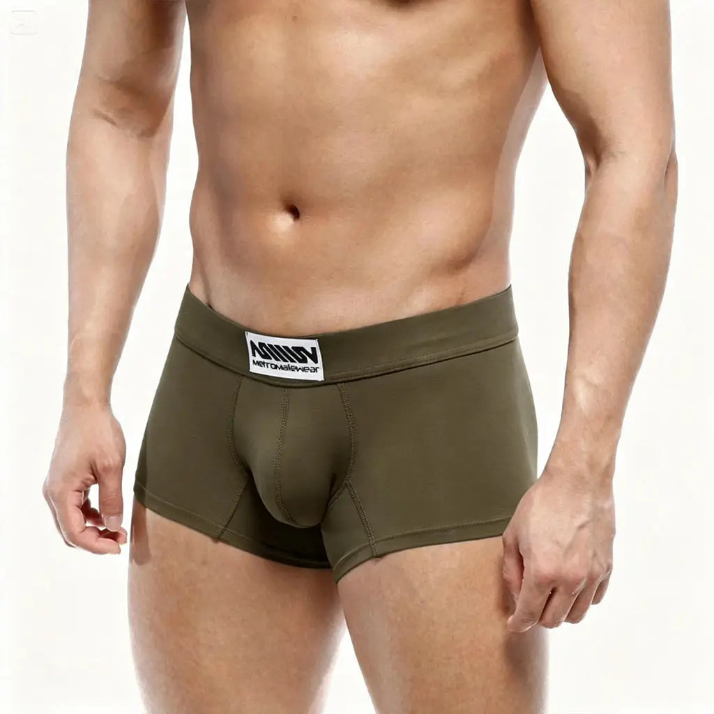 Dark green men's boxer briefs made of soft fabric featuring a comfortable waistband with the MetroMaleWear logo shown on a model