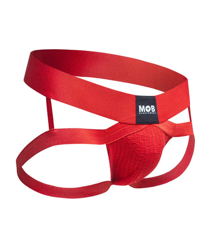Men’s x jockstrap in red satin-like fabric with a black mob brand label on the waistband