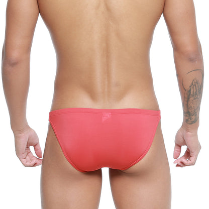 A sleek coral-red form-fitting swim trunk from MetroMaleWear Paleta Bikini 3604-13 designed for swimwear use