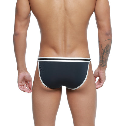 MetroMaleWear link bikini swim trunks in dark blue with white trim featuring a sleek modern design