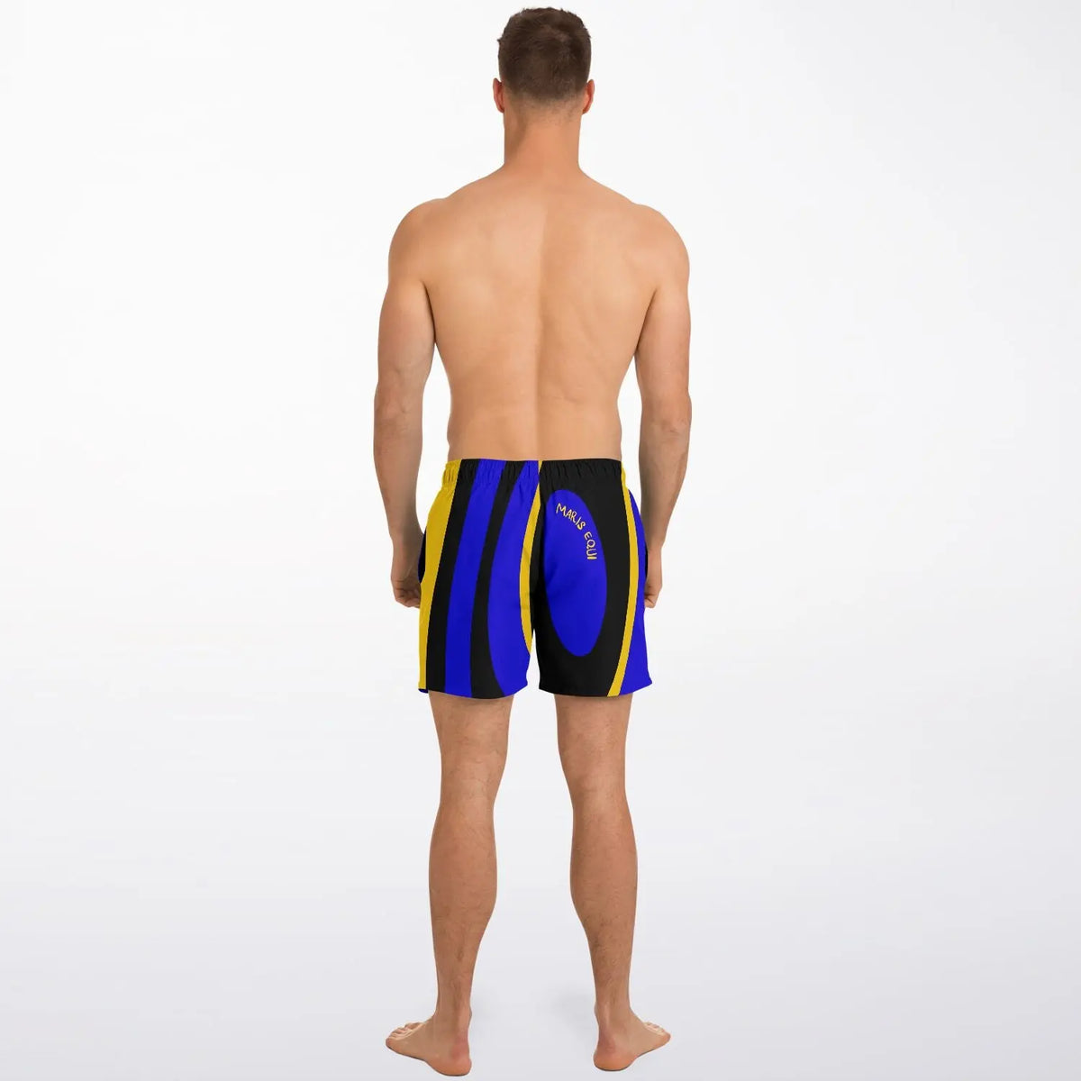 Men's swim shorts in blue yellow and black with a surgeonfish print shown on a model from the back by Maris Equi.