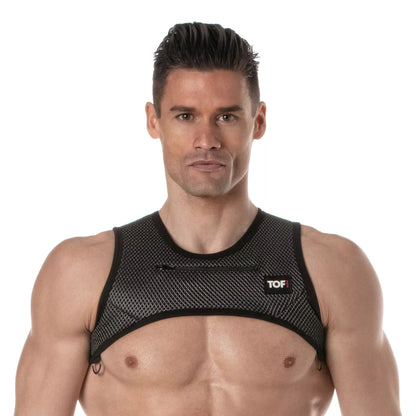 Black mesh 3d zipped pocket harness with small front pocket and tof logo on upper right side