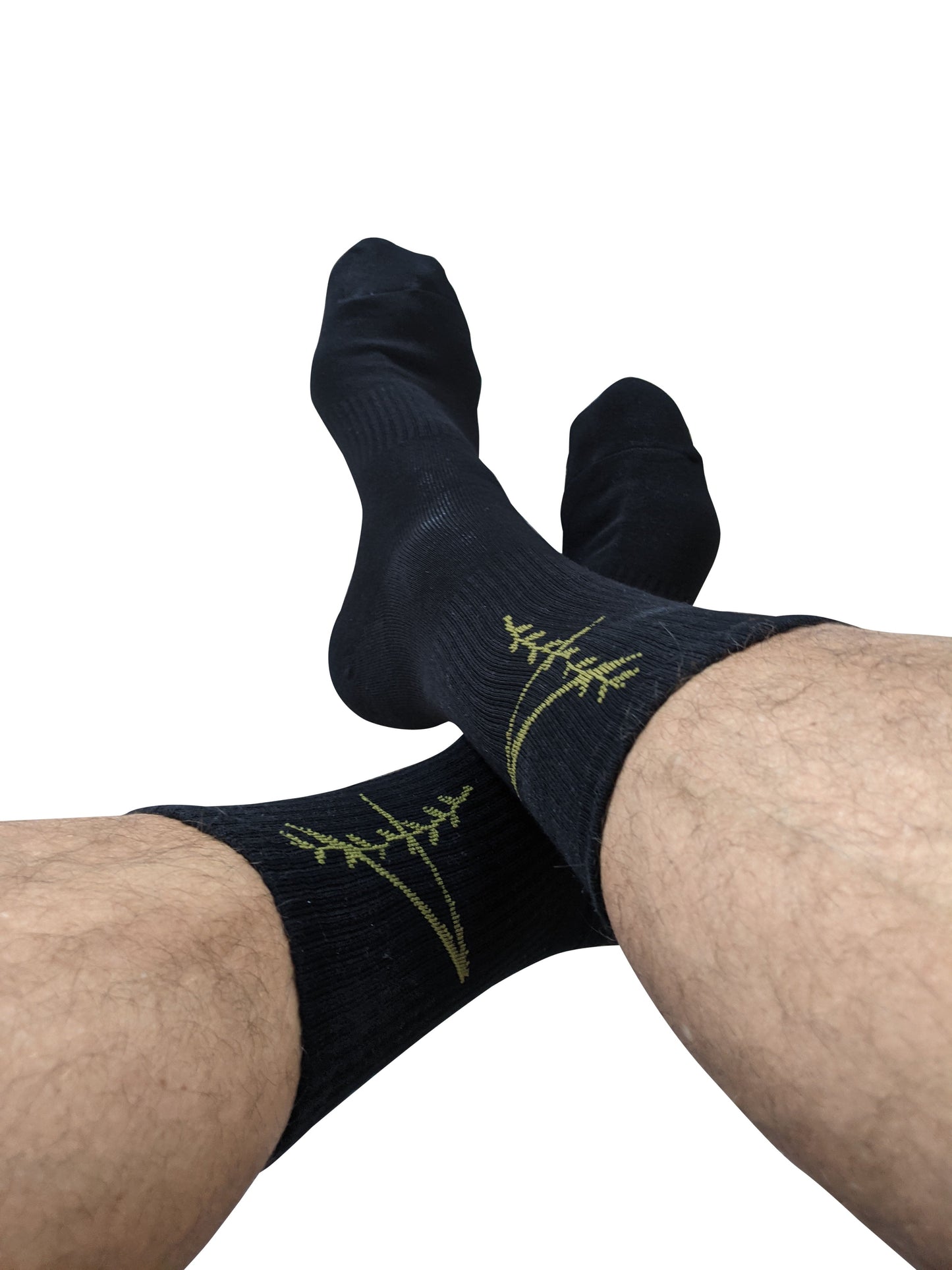 Black sport crew socks with subtle green fern embroidery on the side for comfortable active wear