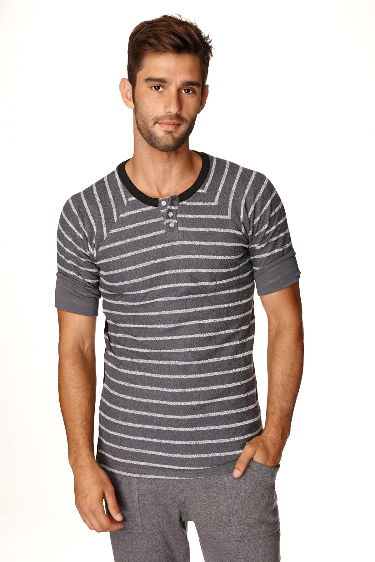 Gray and white striped henley tee with black ribbed collar and button placket in french terry loop fabric