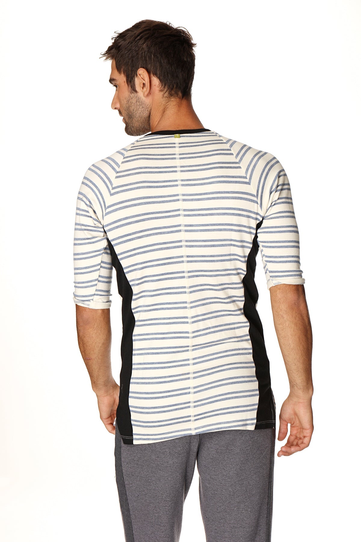 A men’s vintage-stripe henley tee with gray stripes black side panels in french terry loop fabric