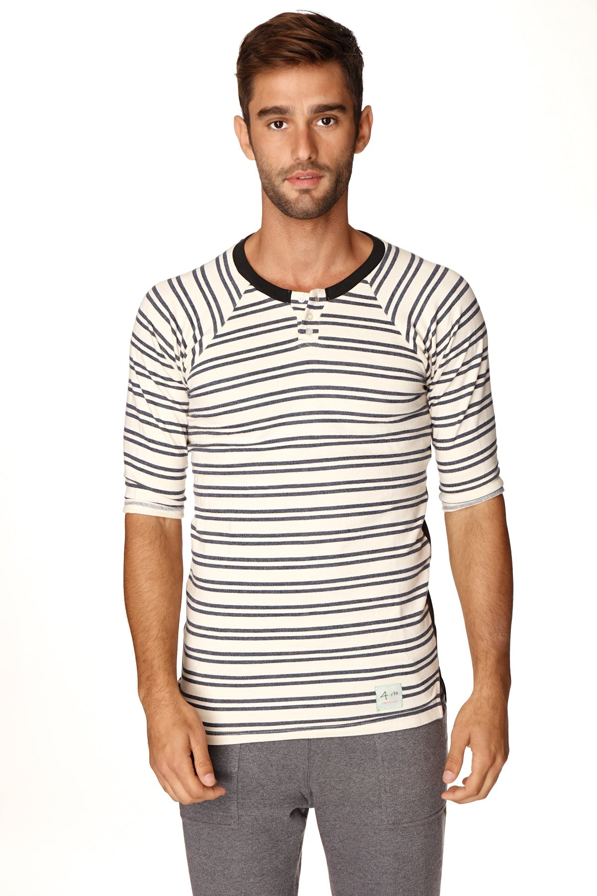 A men’s short-sleeved white and black striped henley shirt with ribbed collar in french terry loop fabric