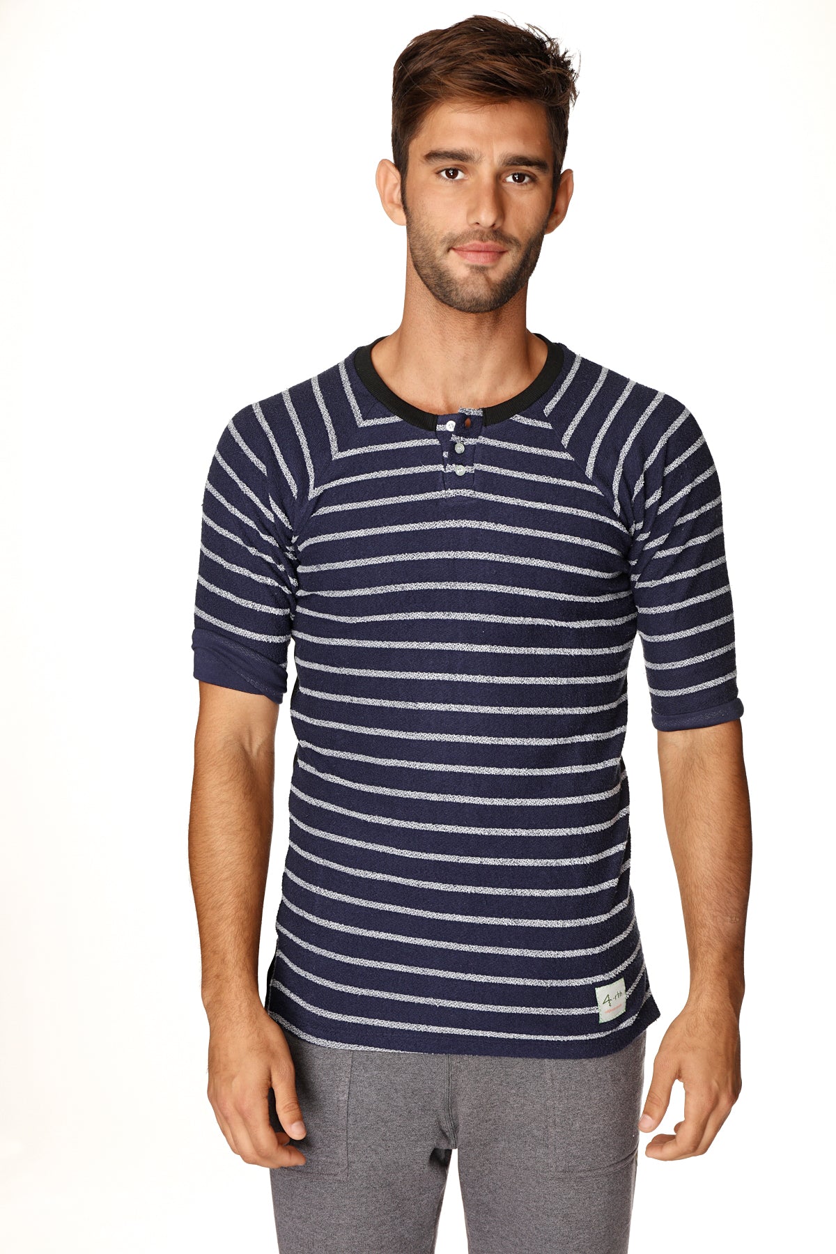 Navy blue and white striped short-sleeved henley tee with black ribbed collar and cuffs in french terry loop fabric