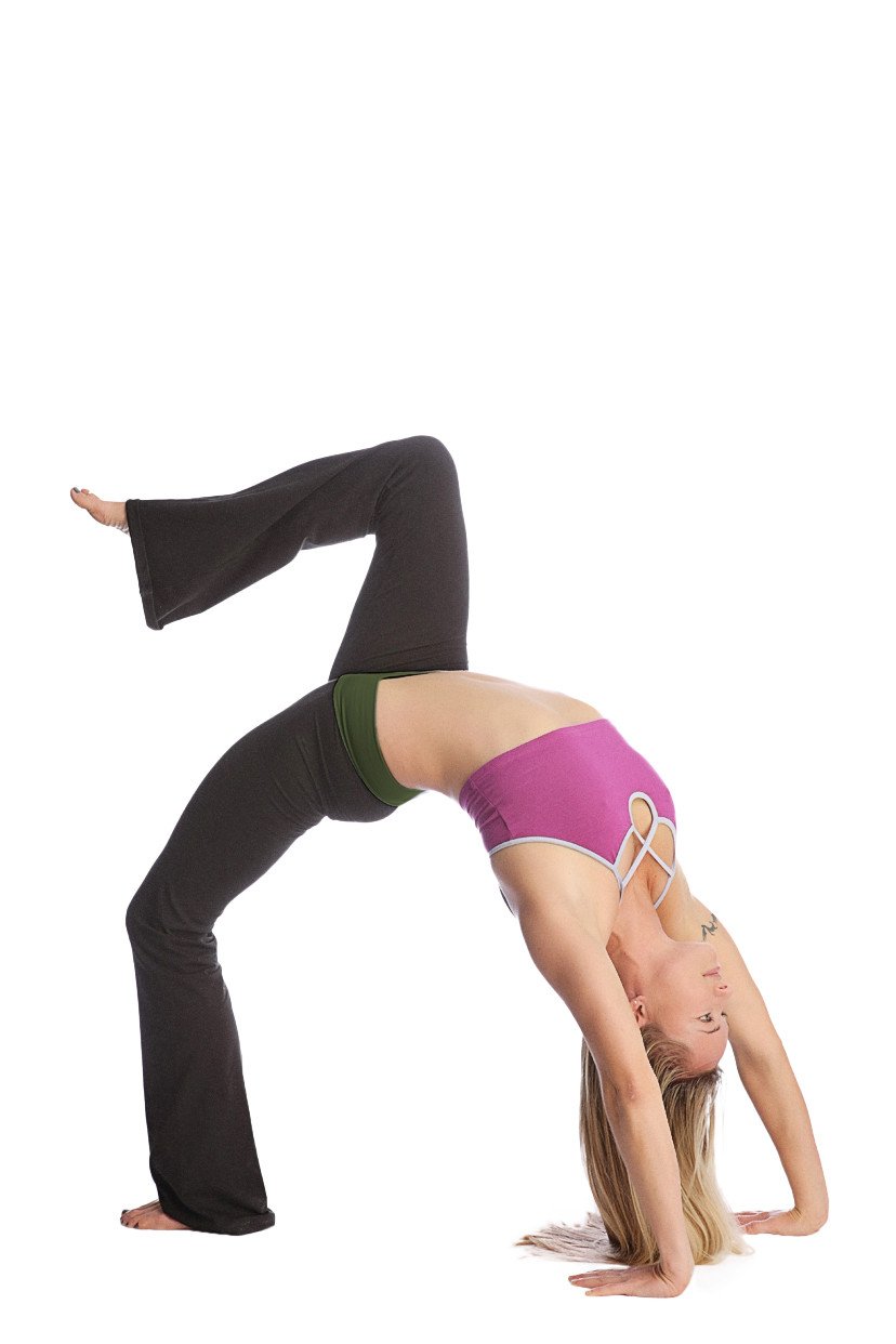 A woman performs an advanced bridge pose wearing 4-rth women’s classic black flared yoga pants and a purple sports bra
