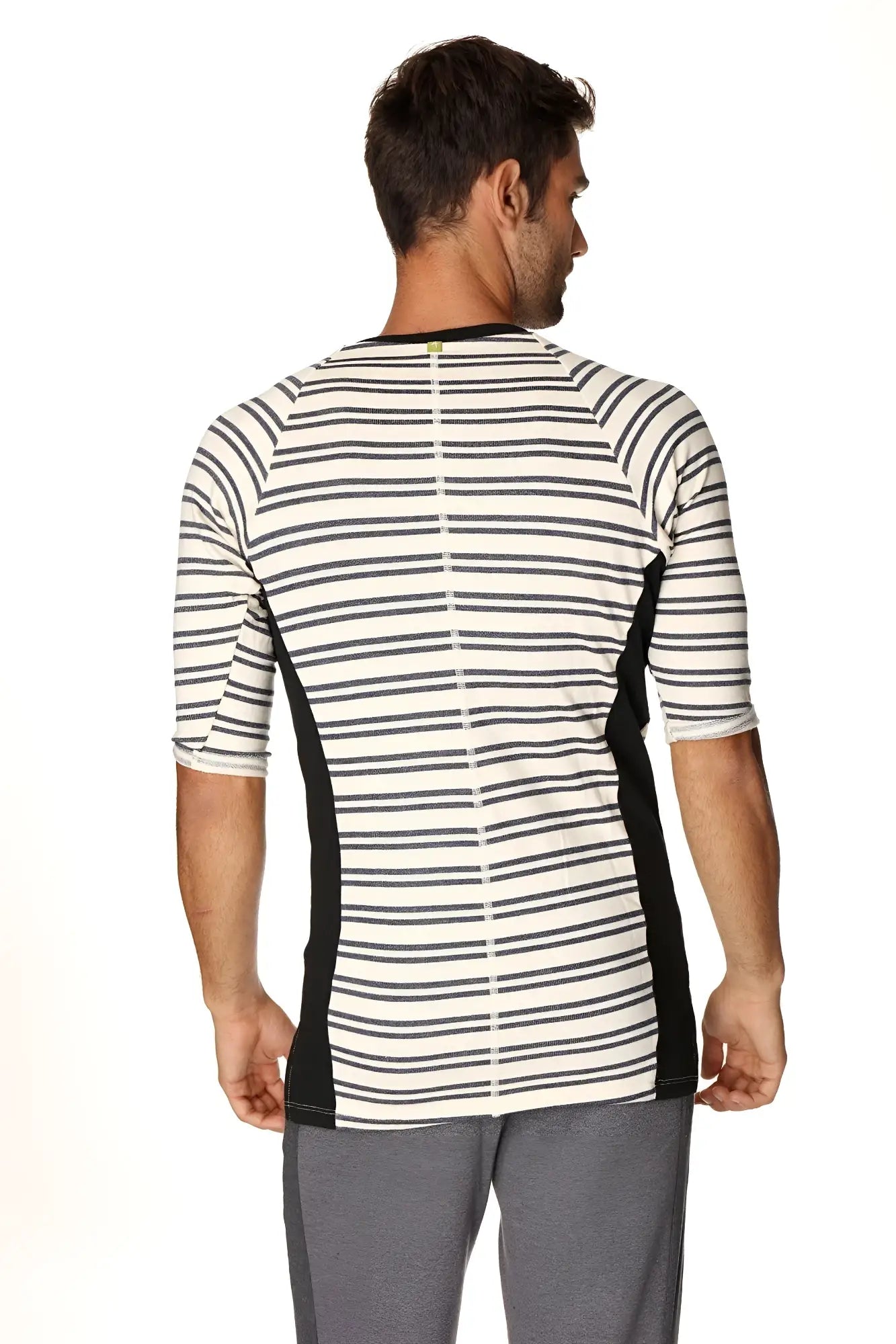 A men’s three quarter sleeve vintage stripe henley tee in navy french terry loop with black side panels
