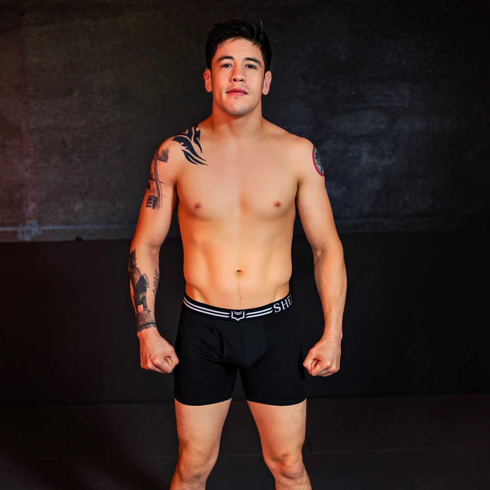 Black dual pouch boxer briefs with white striped waistband and she logo from sheath 4.0 best-seller bundle
