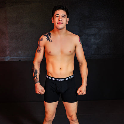 Black dual pouch boxer briefs with white striped waistband and she logo from sheath 4.0 best-seller bundle
