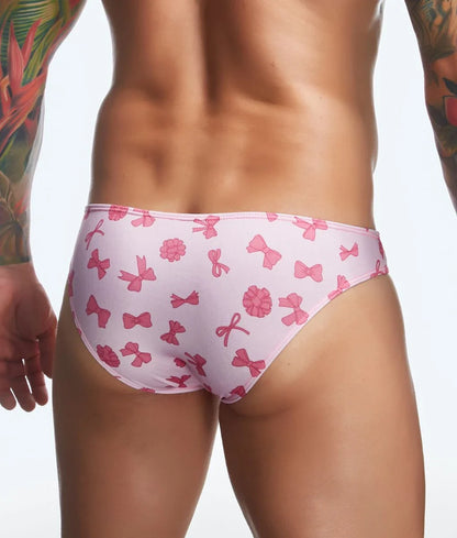 Justin plus Simon classic mens bikini swim trunks with pink bow and flower pattern perfect for fun prints swimwear