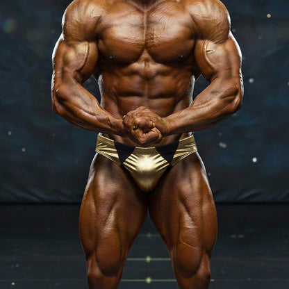 Shiny gold metallic metro musclwear zeus muscle trunk briefs with black triangular accents for men